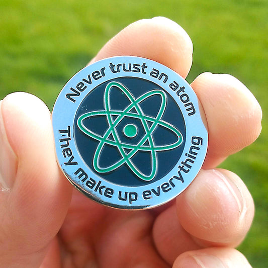 Never Trust an Atom They Make Up Everything Enamel pin